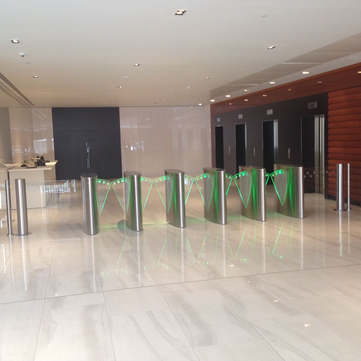 Office lobby turnstiles for controlled commercial access